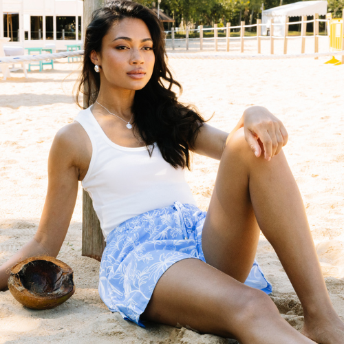 Model wearing the Linen Latte Pants from Palm Collective wit a white top