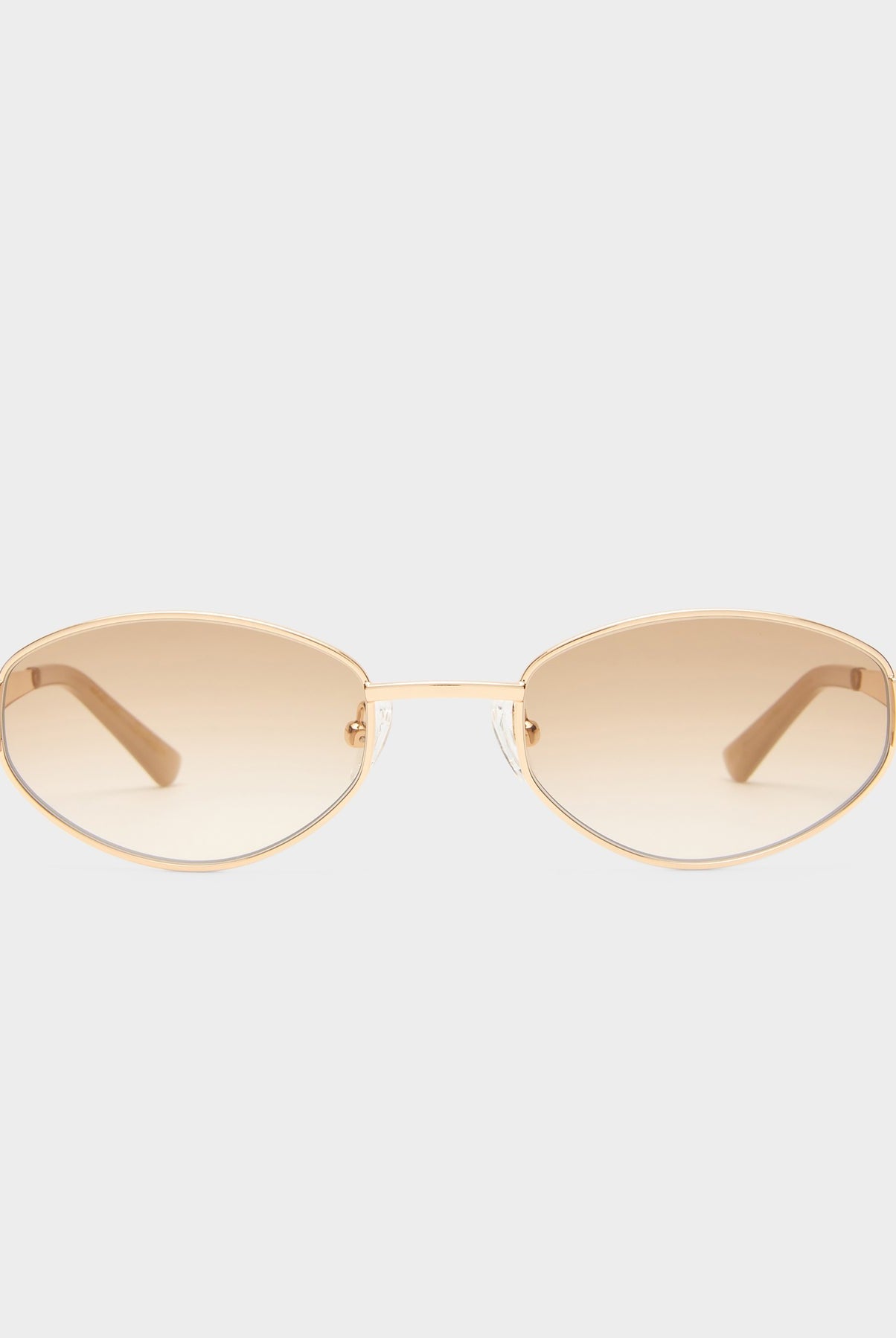 Gold-framed sunglasses with gold lenses on a white background