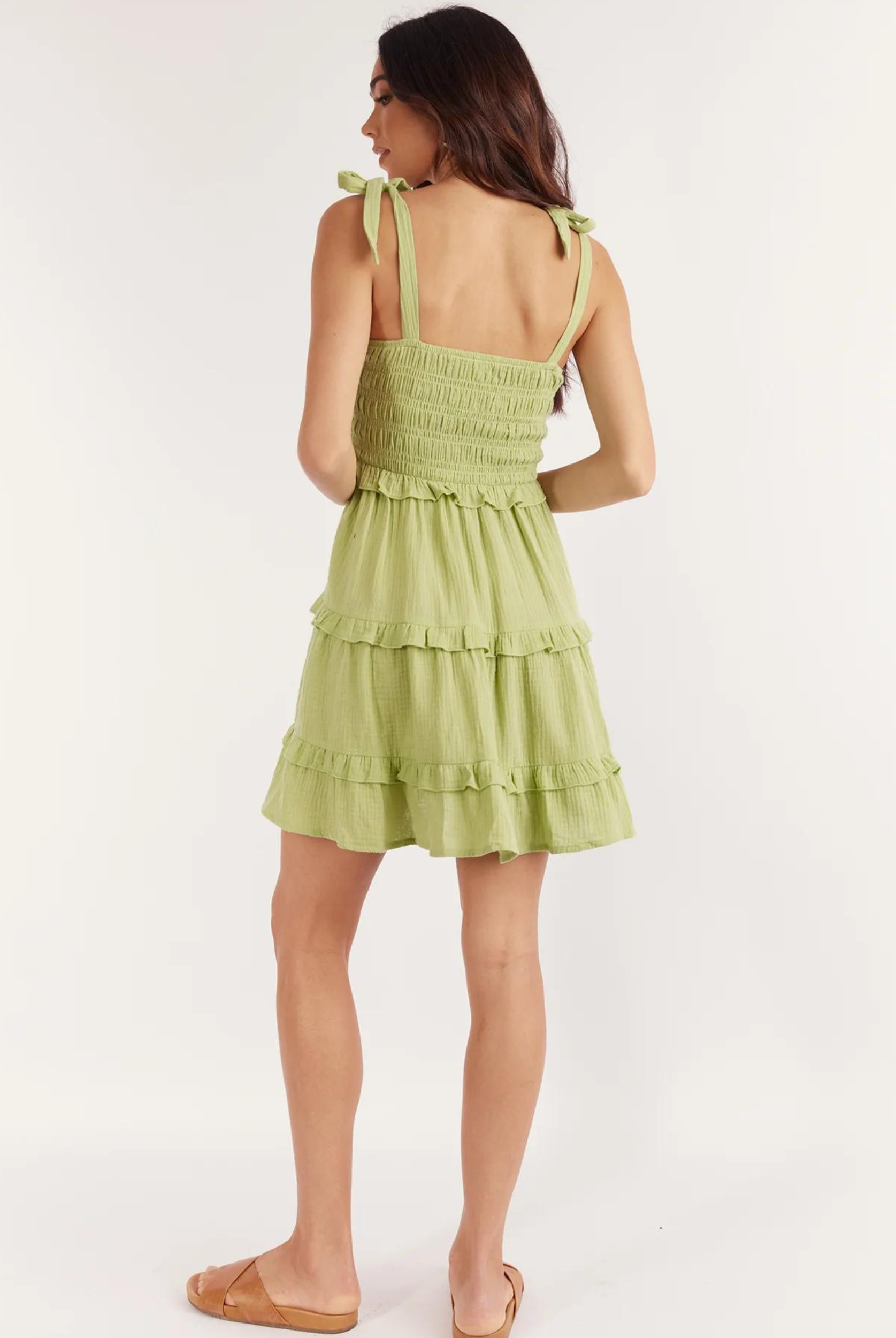 Strappy pale green mini dress with tie shoulders