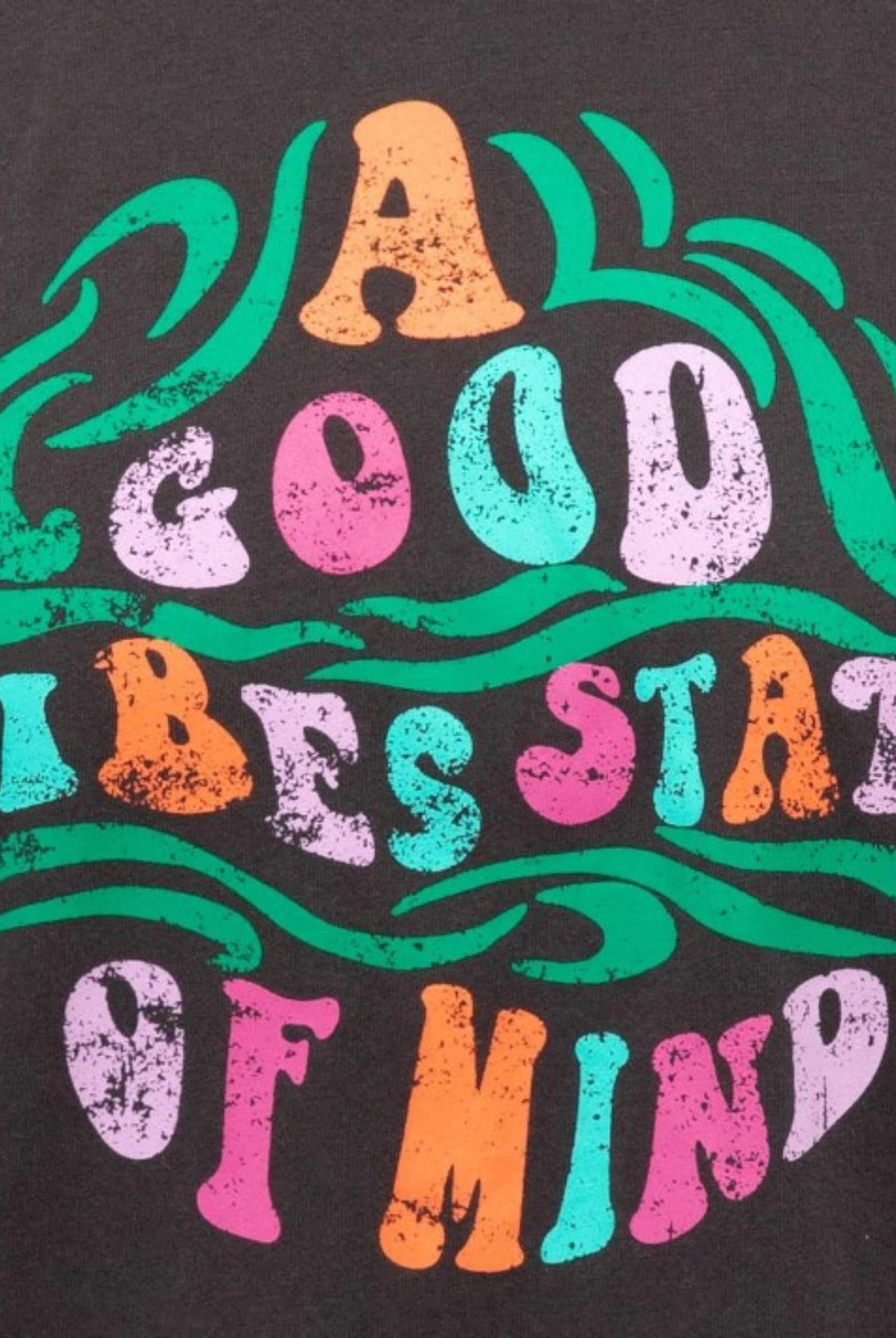 Washed black tee with Good Vibes Motif