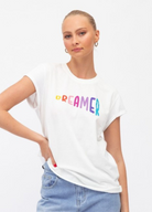 White dreamer motif tee with multicoloured letters