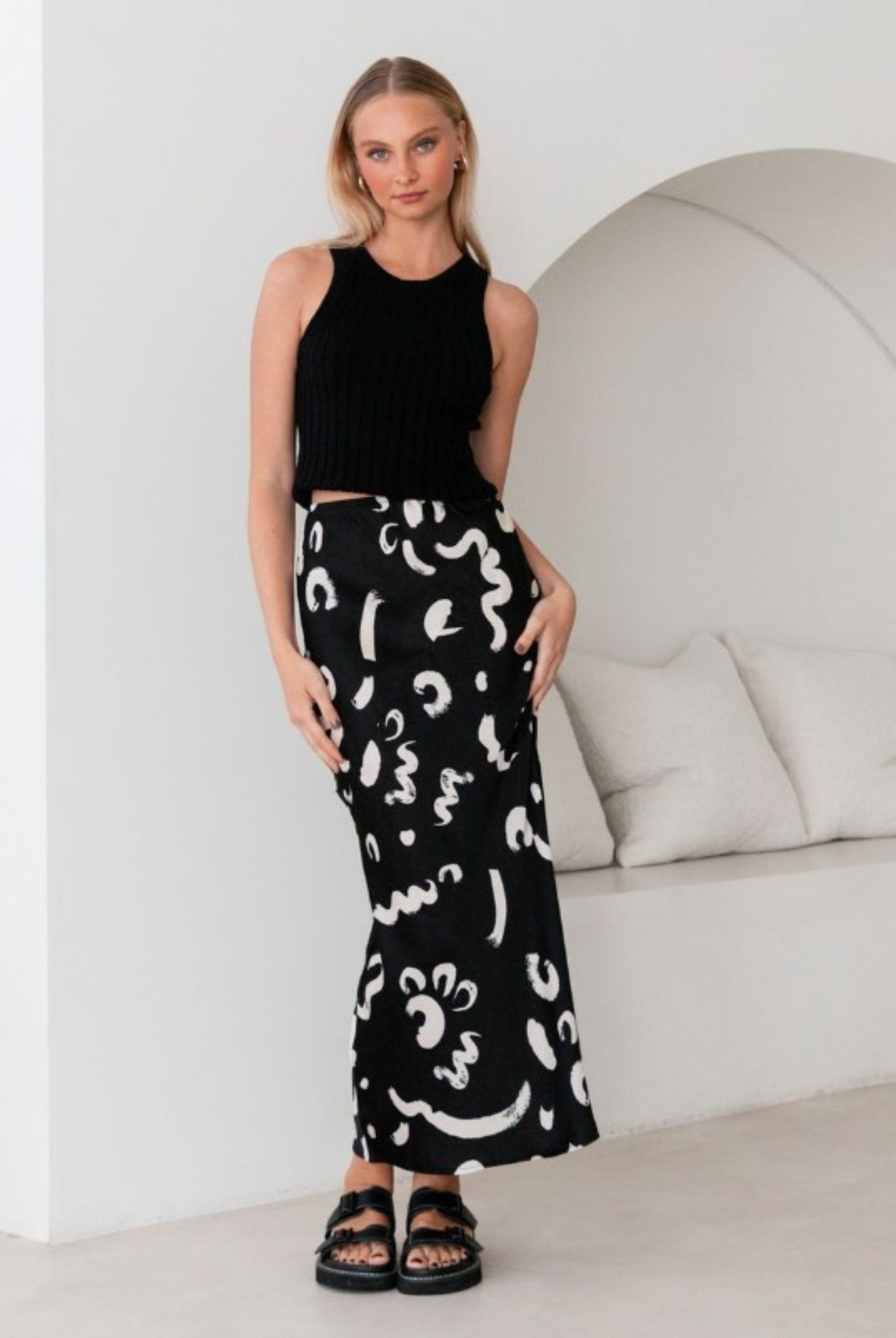 Model wearing the Kyria Skirt from Paper Heart in black and white print