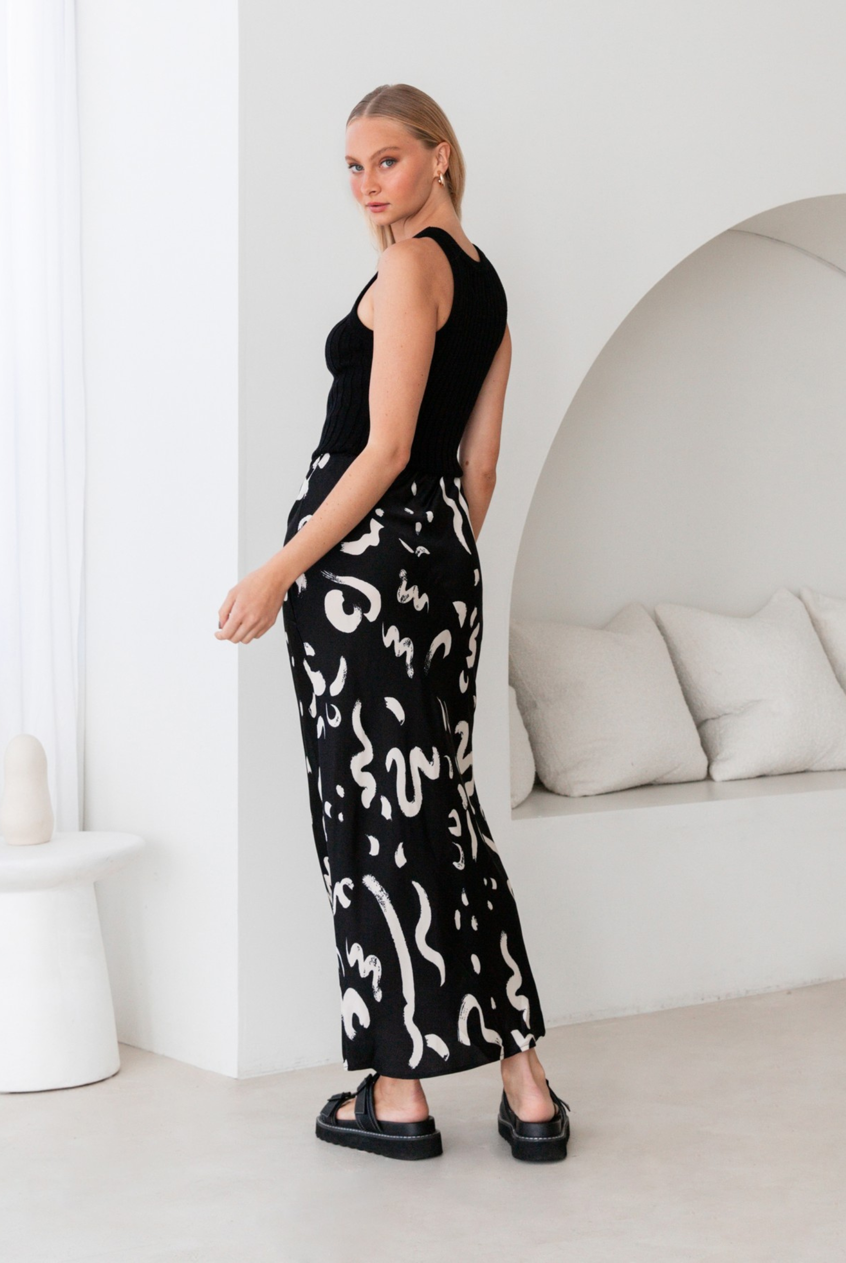 Model wearing the Kyria Skirt from Paper Heart in black and white print
