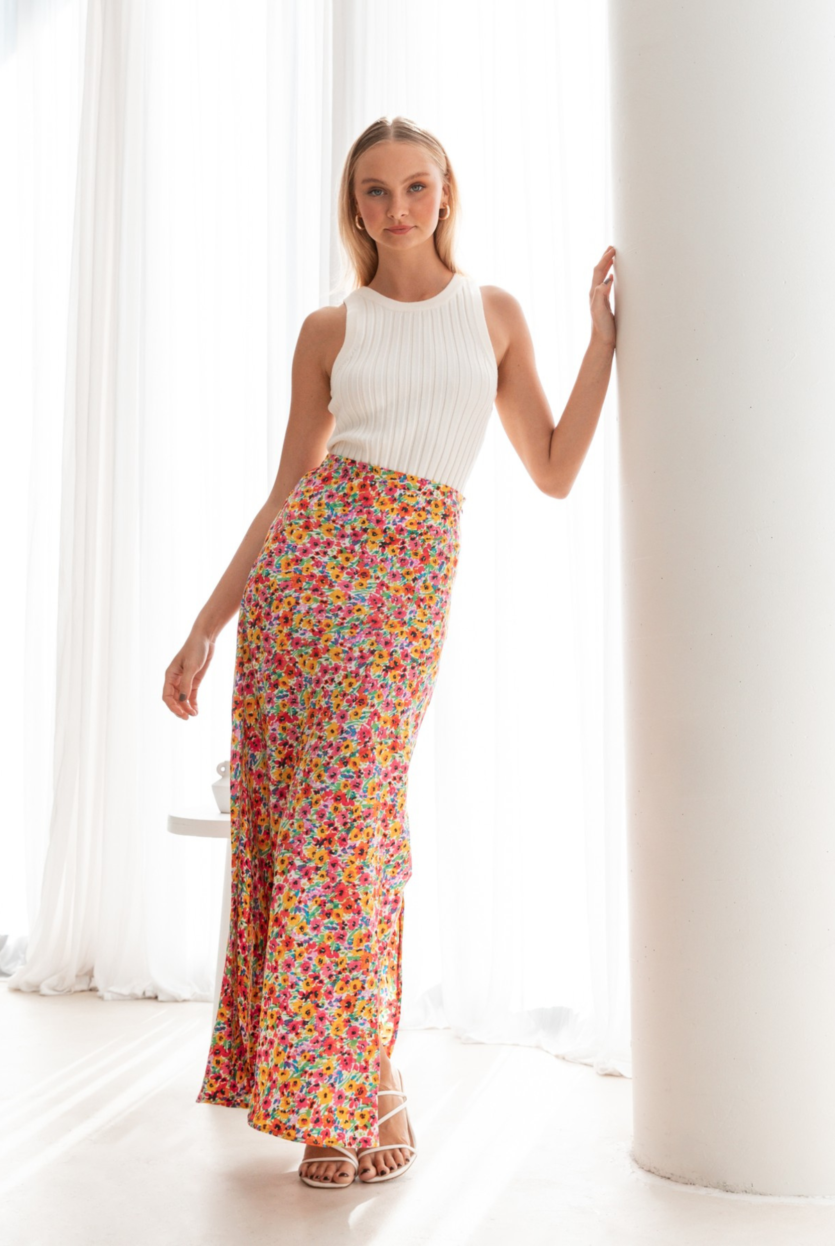 Model wearing the off white thea tank