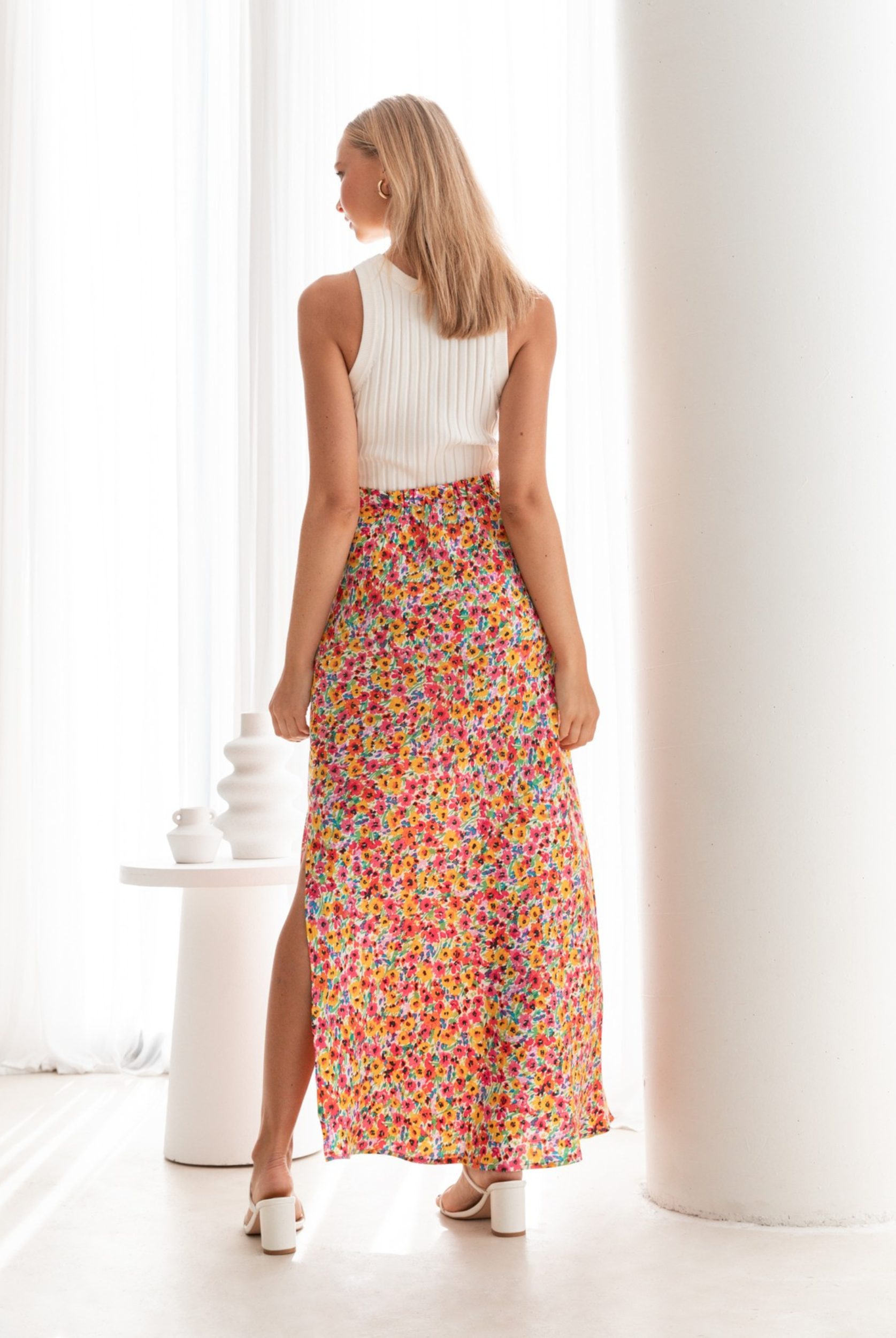 Model wearing the Lucia Skirt and Thea tank from Paper Heart