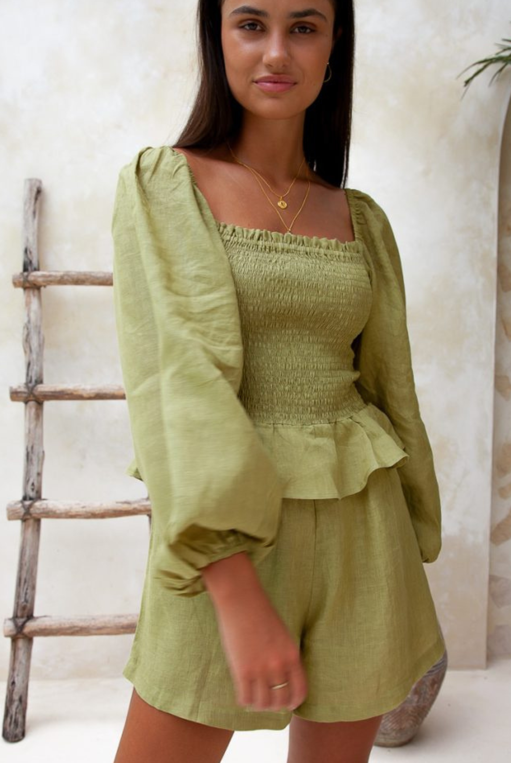 Moss green sustainable linen playsuit from Palm Collective