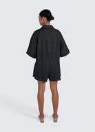 ESTL Black relaxed fit playsuit with shell buttons and a half sleeve