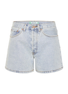 Model wearing the Bohemian Traders Mid Thigh ice wash short