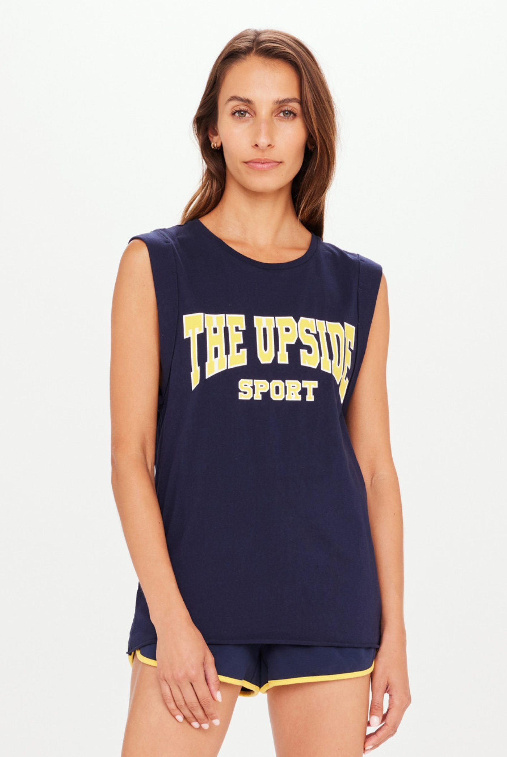 The Upside Ivy Leage Tank in navy with yellow and white logo design