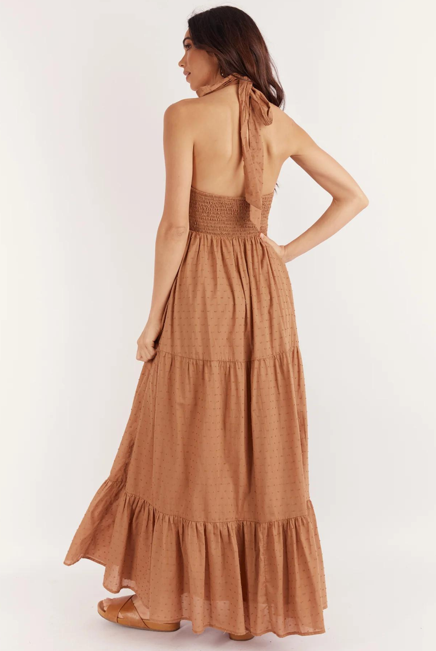 Halterneck maxi dress in brown spot print fabric with a back neck tie