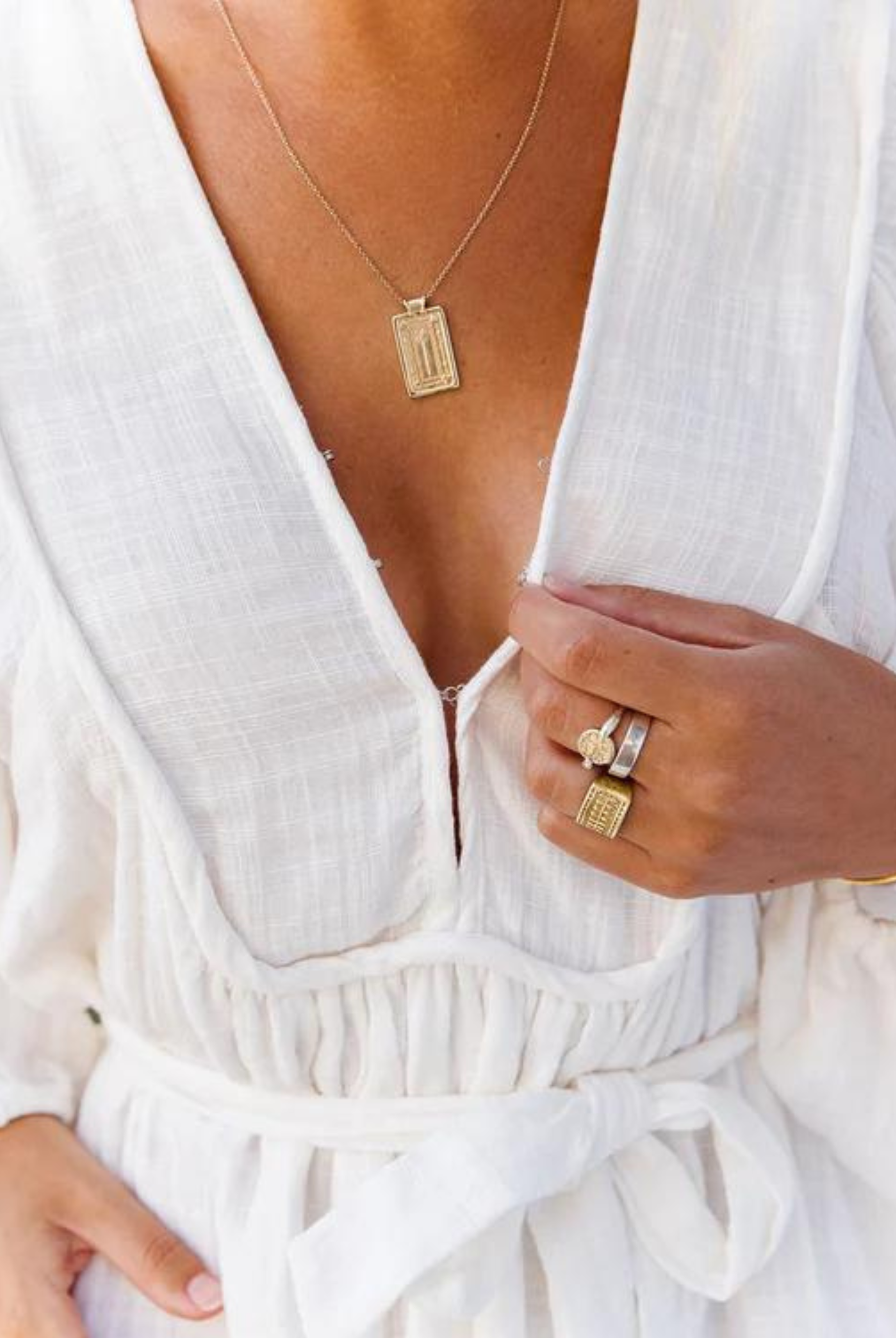 Long Sleeve White mini dress with elasticated cuff sleeves and a line skirt