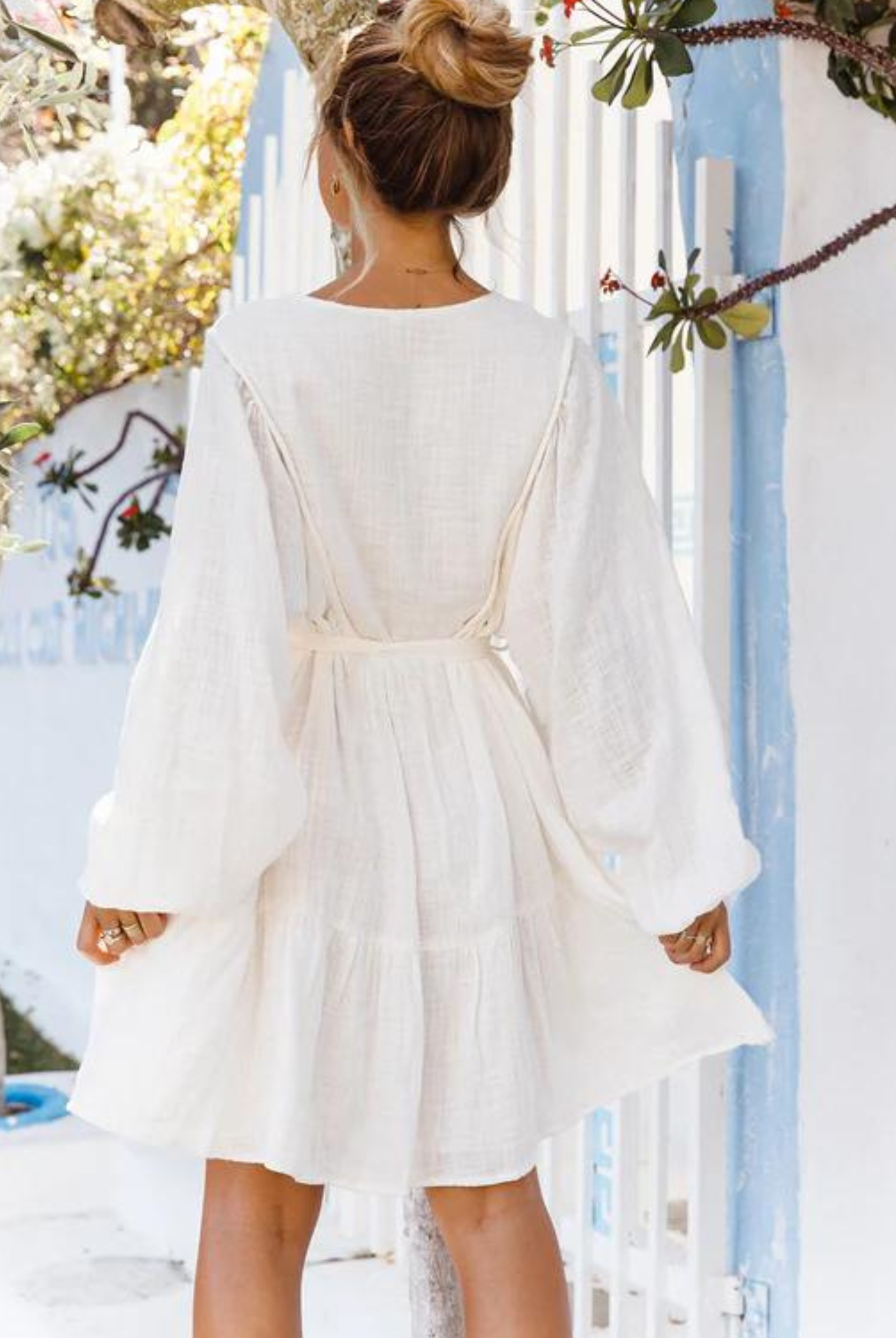 Long Sleeve White mini dress with elasticated cuff sleeves and a line skirt