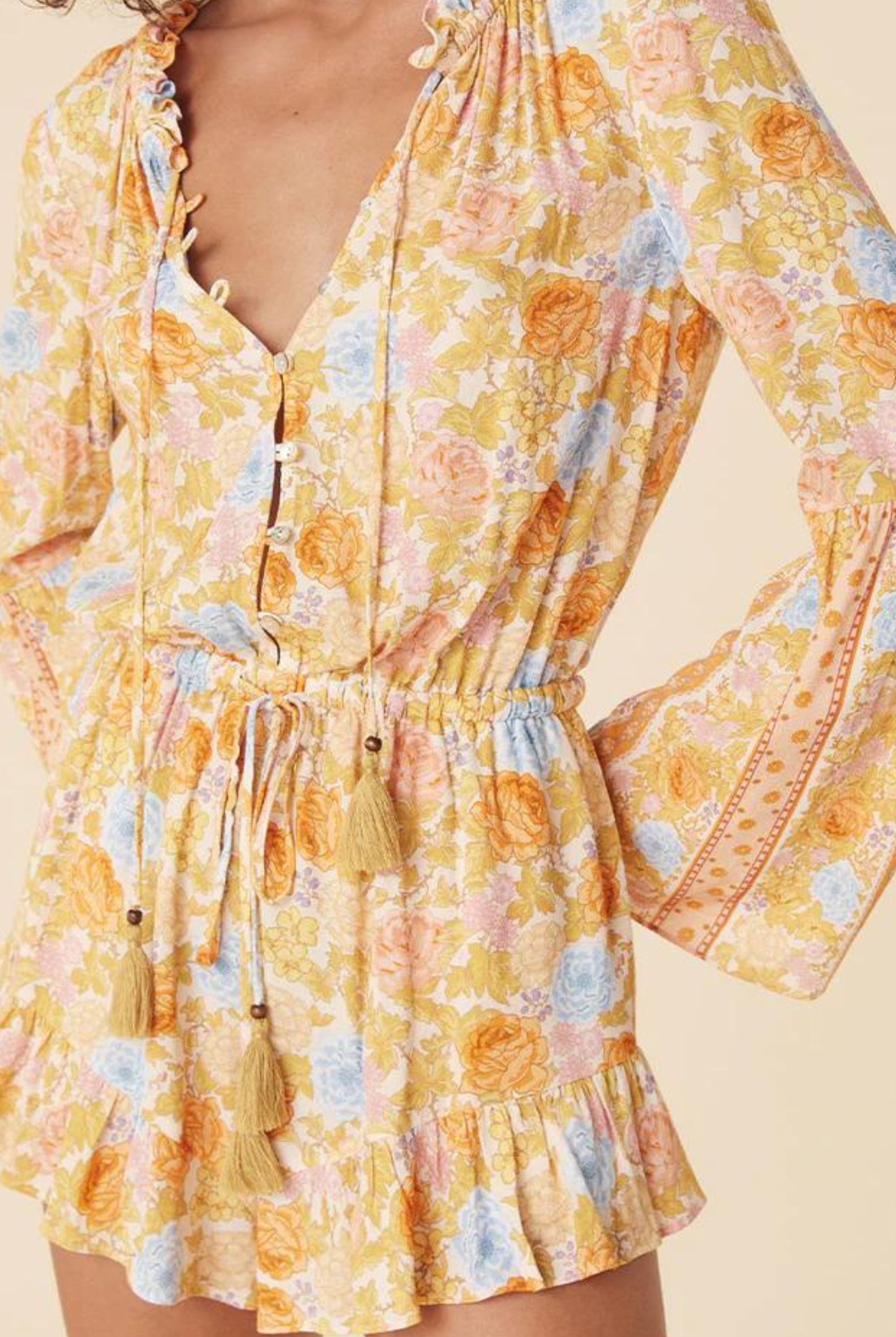 Model wearing the enchanted wood romper from Spell