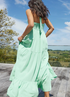 Halterneck linen blend maxi dress with tiering from girl and the sun