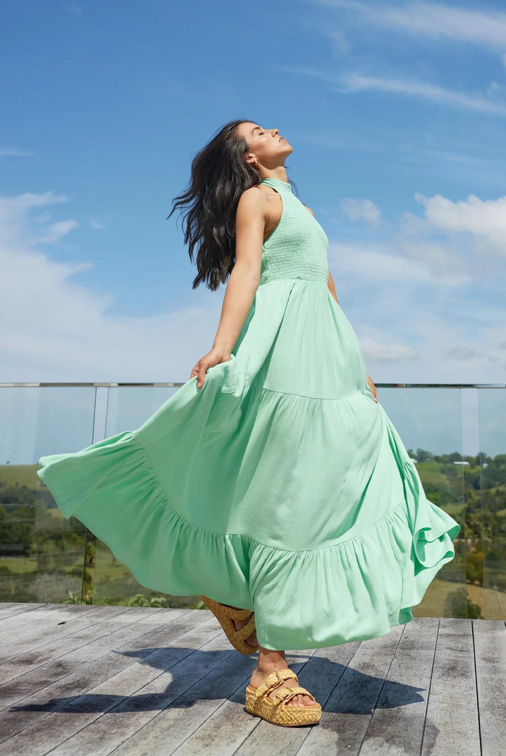 Halterneck linen blend maxi dress with tiering from girl and the sun