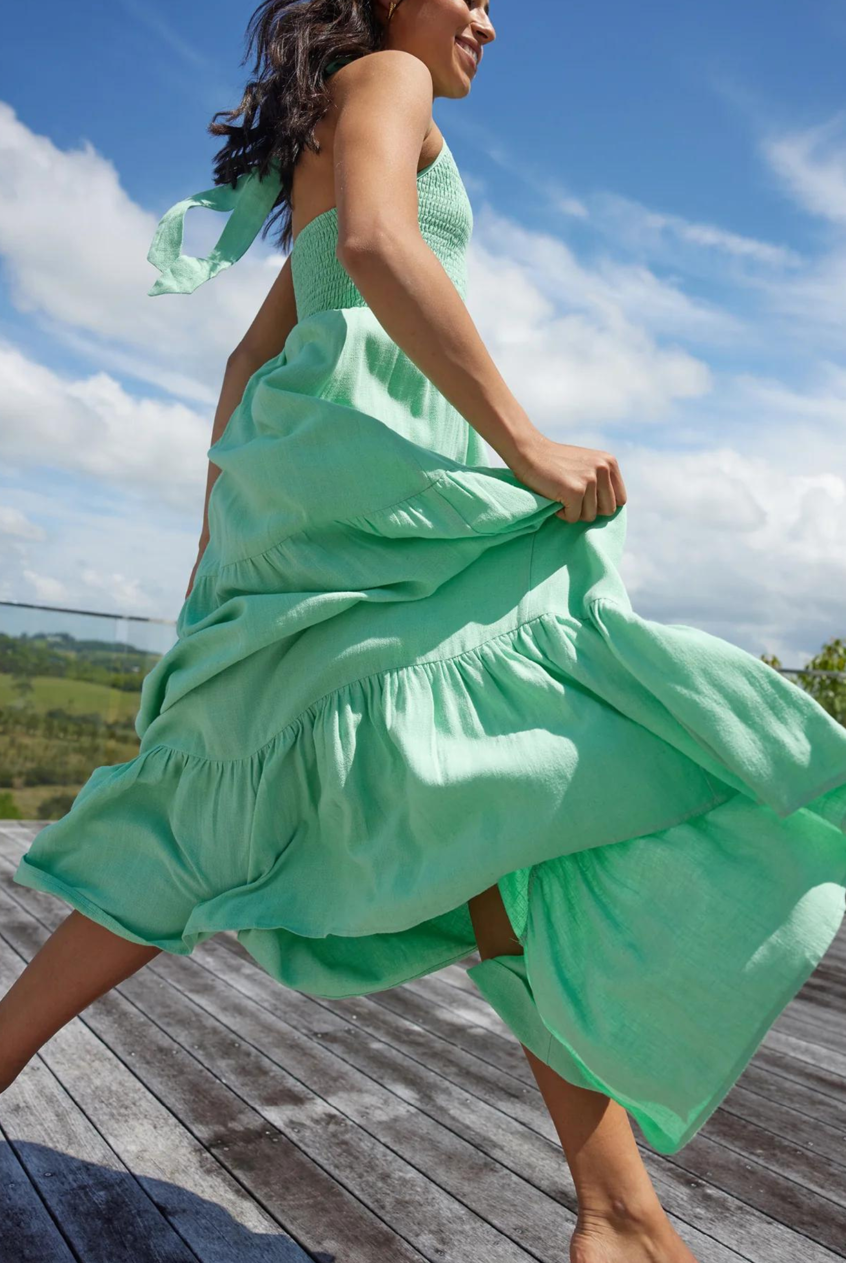 Halterneck linen blend maxi dress with tiering from girl and the sun