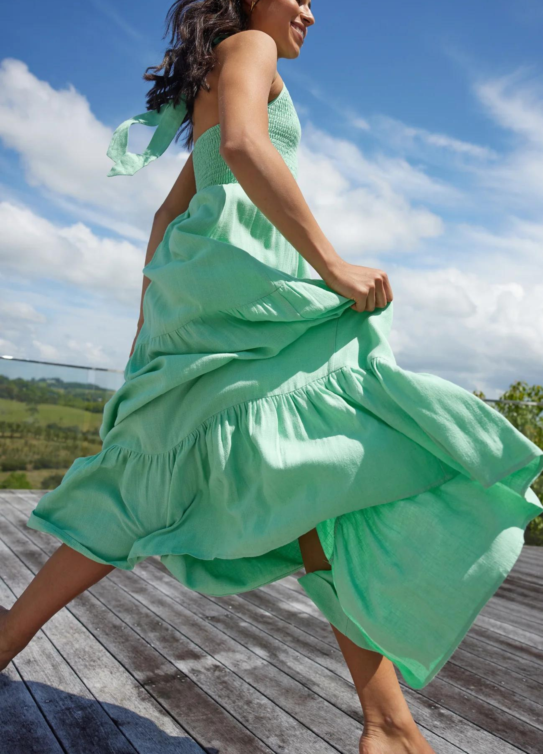 Halterneck linen blend maxi dress with tiering from girl and the sun