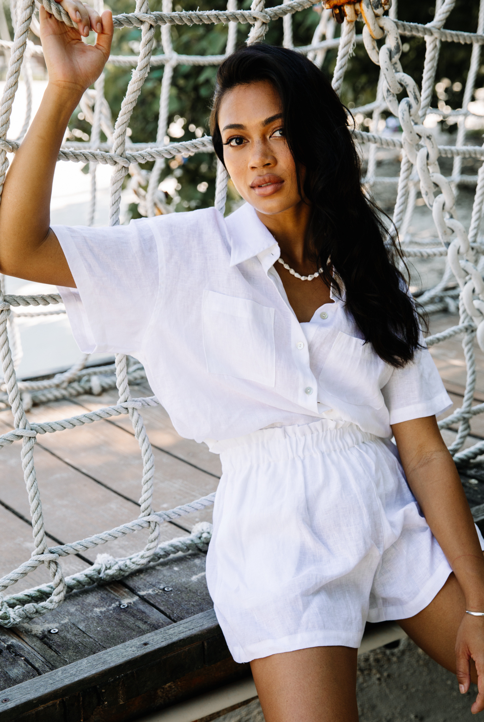 White linen shirt with shell buttons and short sleeve
