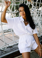 White linen shirt with shell buttons and short sleeve