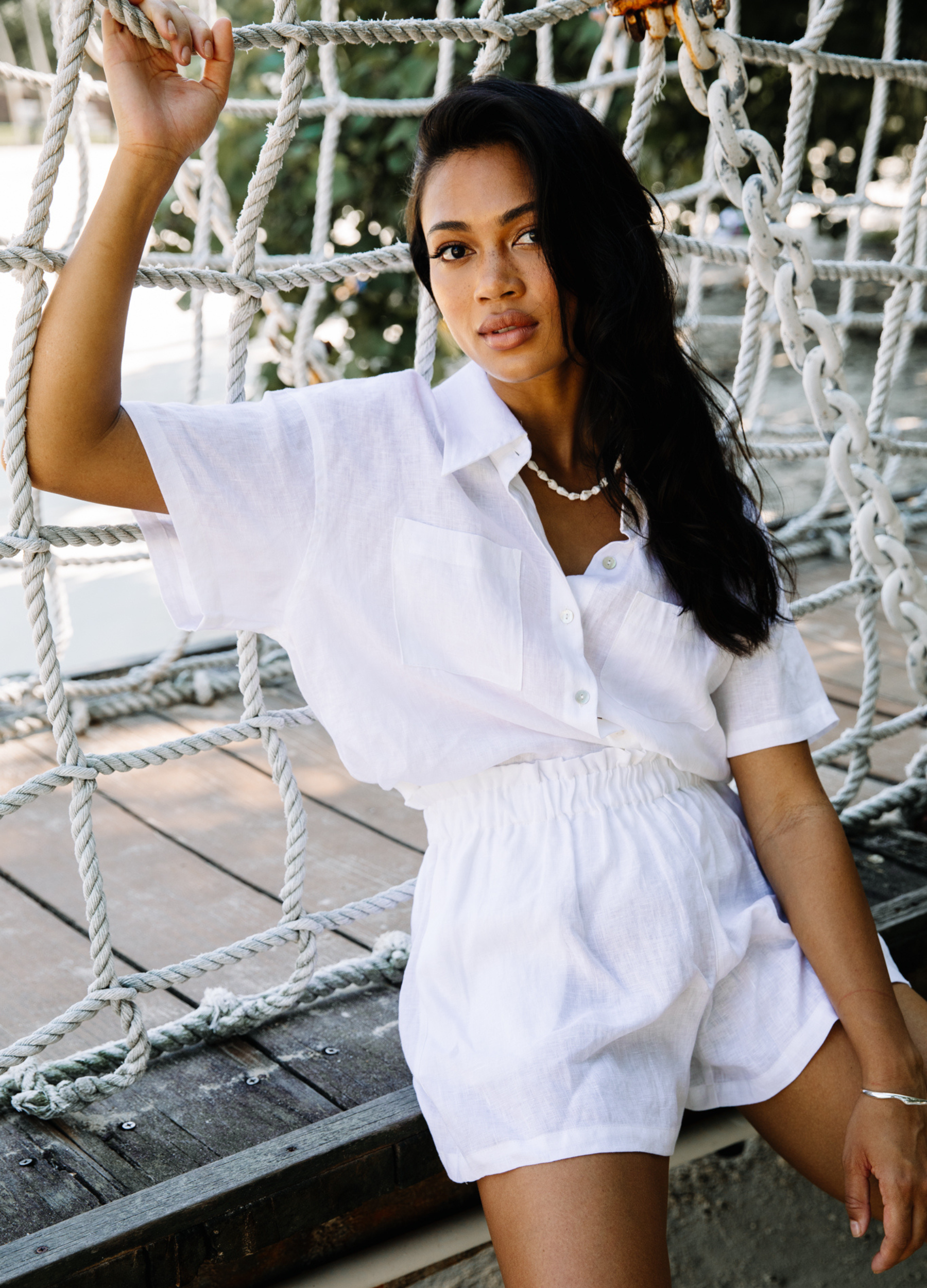 White linen shirt with shell buttons and short sleeve