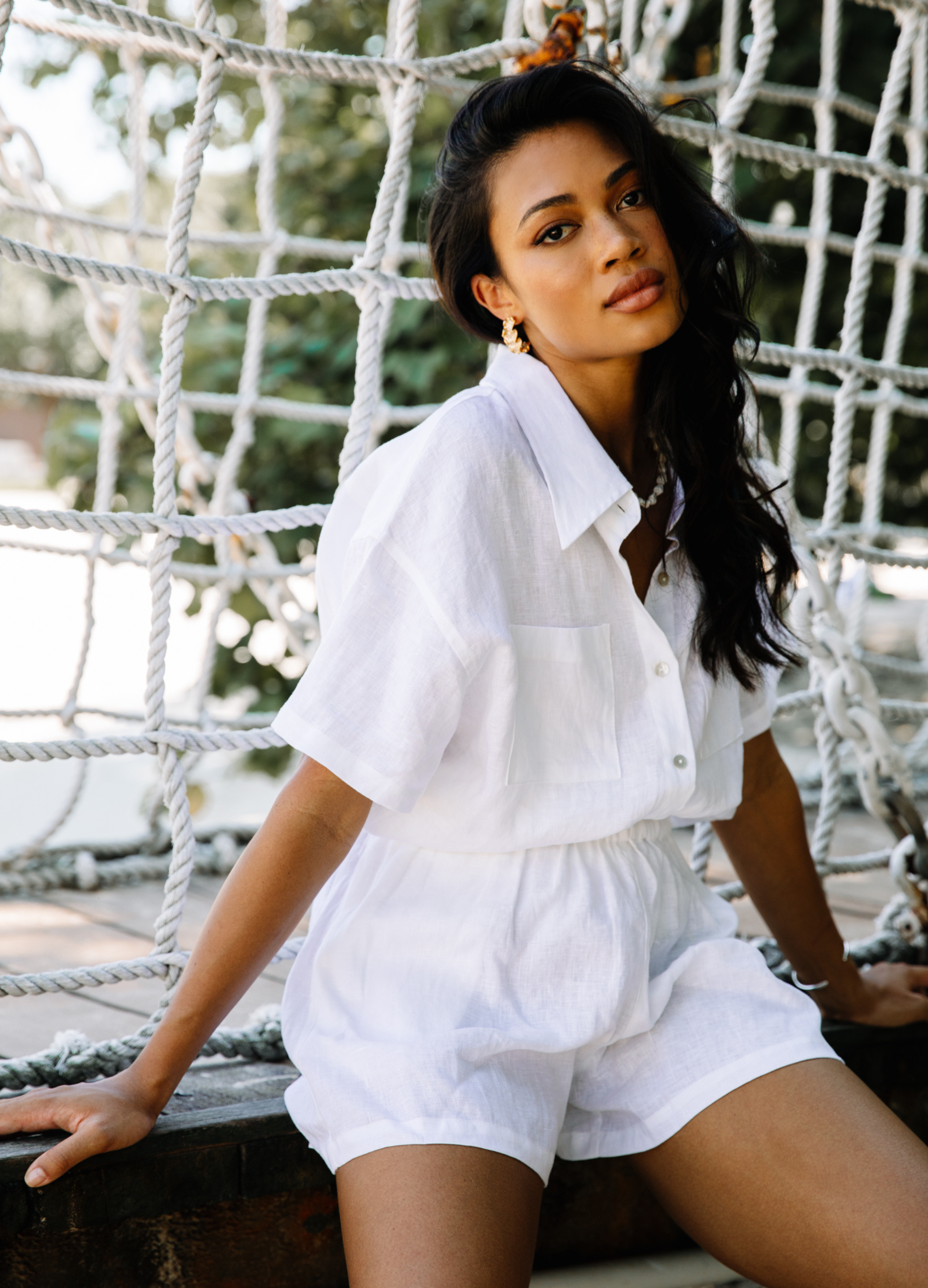 White linen shirt with shell buttons and short sleeve