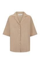 Mocha coloured lounge set from Araminta James