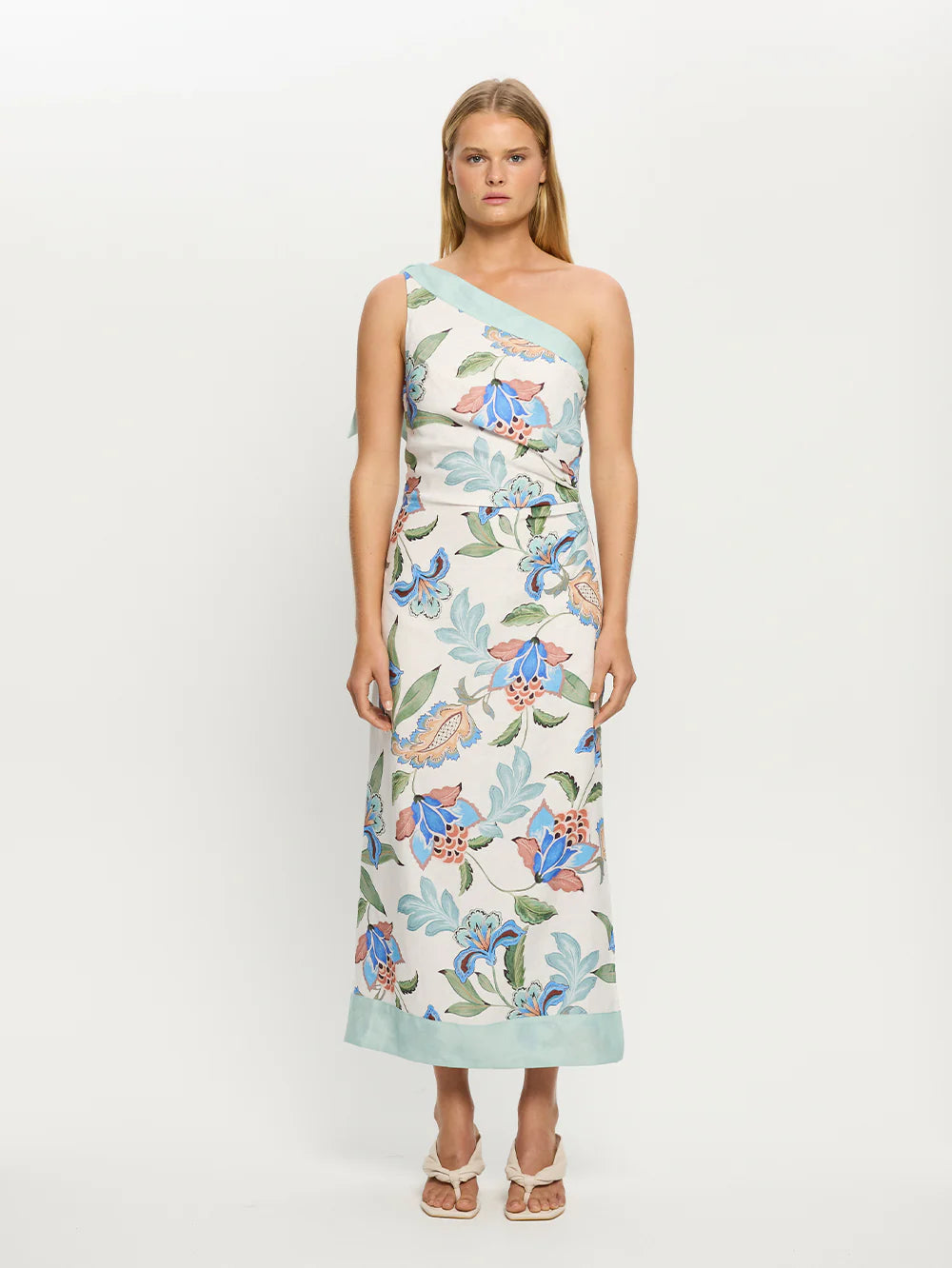 Woman wearing one shoulder floral print midi dress from Kivari Azure