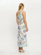 Woman wearing one shoulder floral print midi dress from Kivari Azure