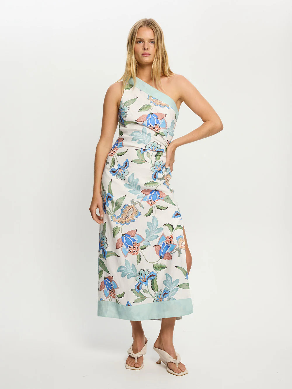 Woman wearing one shoulder floral print midi dress from Kivari Azure