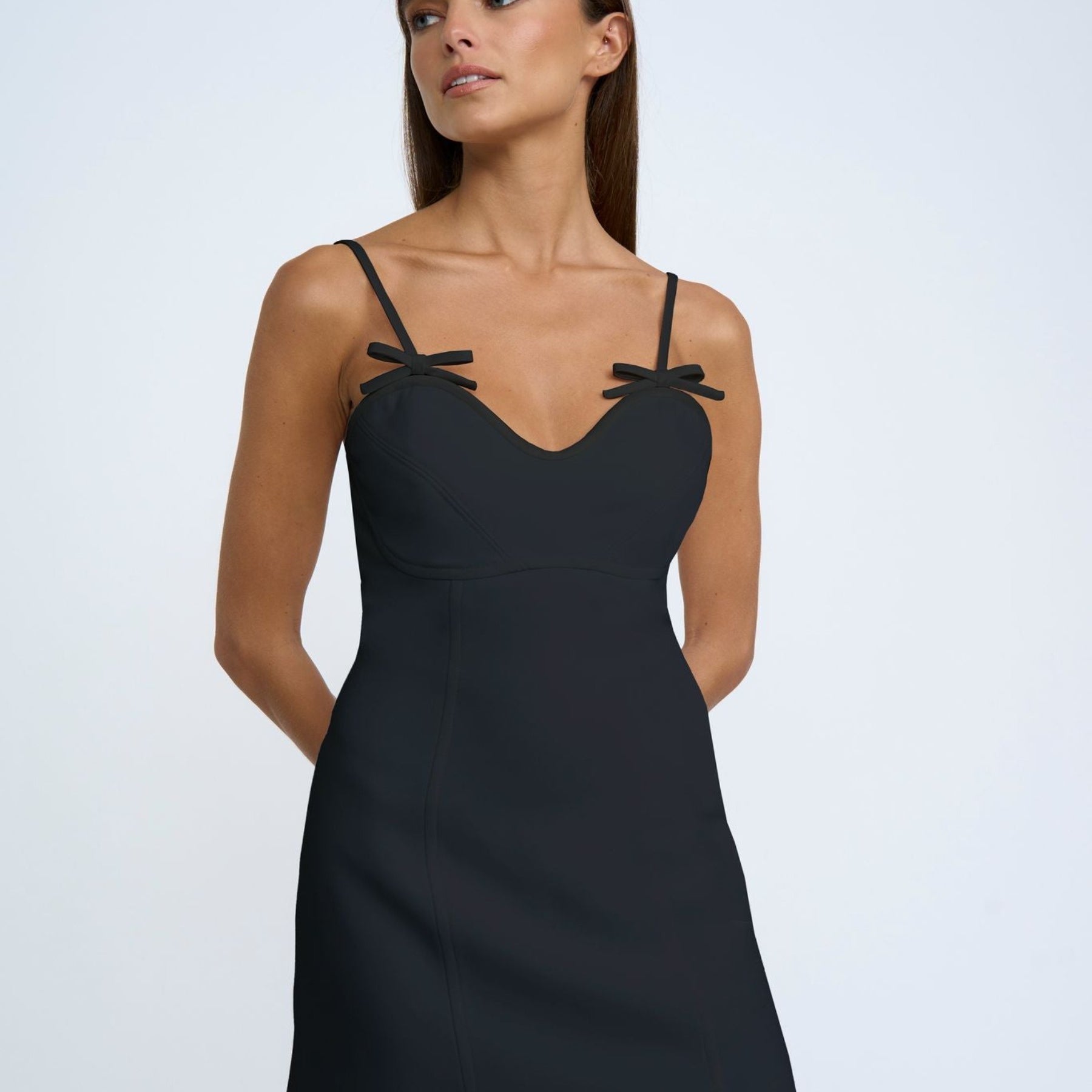 Model wearing the Bettina Bow Shift Dress in Black
