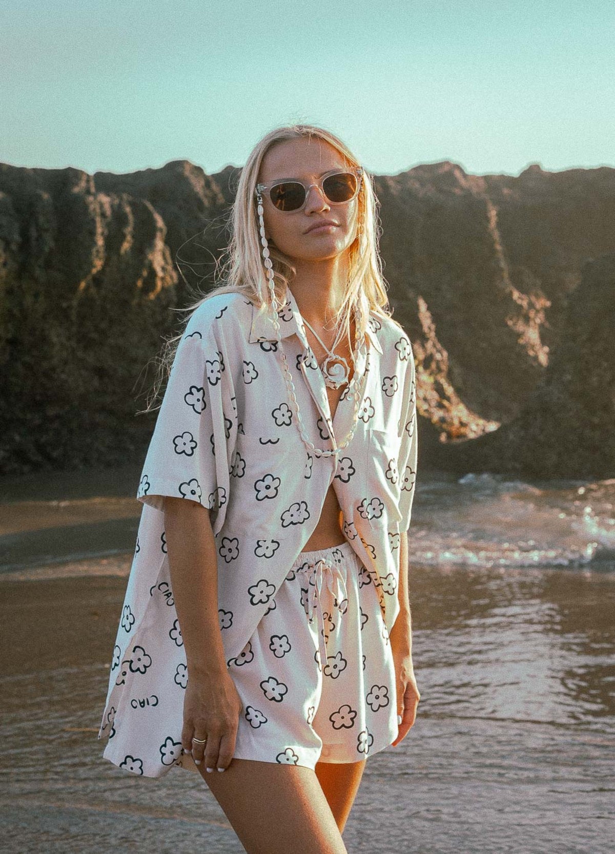 Shorts in daisy print from palm collective