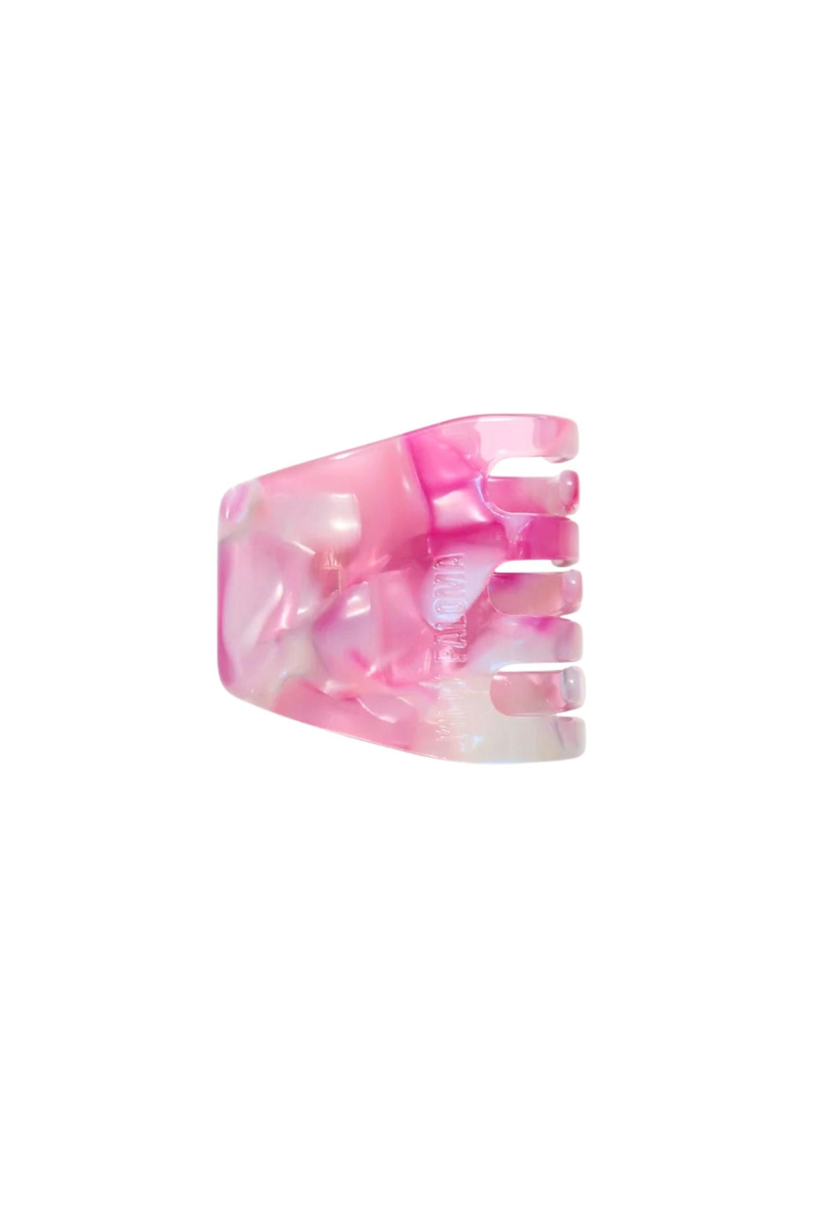 Pink and white marbled hair clip on a white background