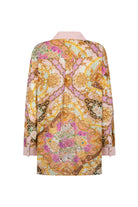 Colorful patterned shirt on a white background