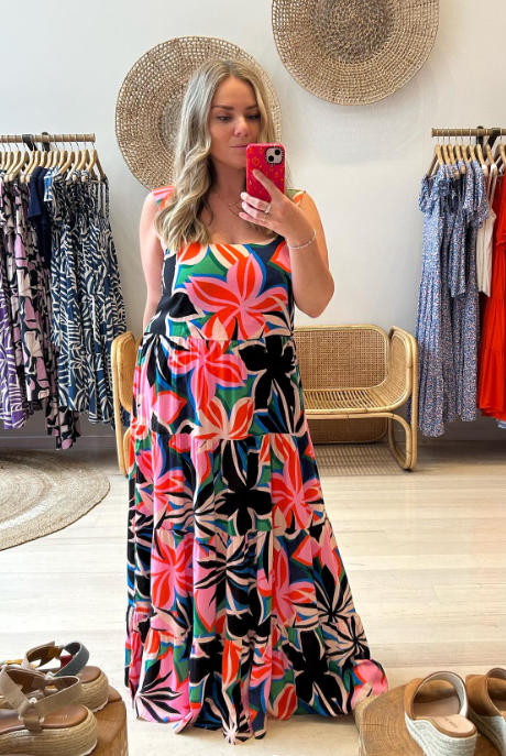 Blonde Woman wearing the Mister Zimi Paradise Print Dress