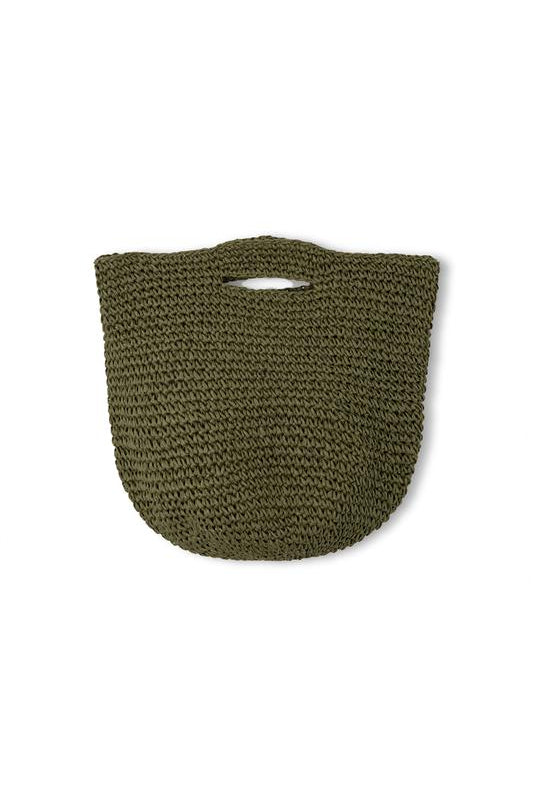 Green woven bag on a white background