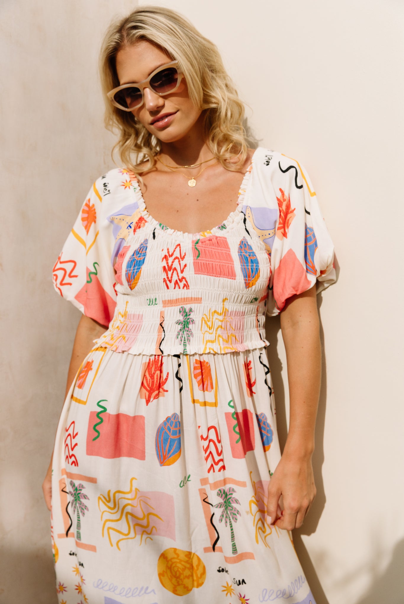 Shirred bodice midi dress in striking print inspired by Ibiza