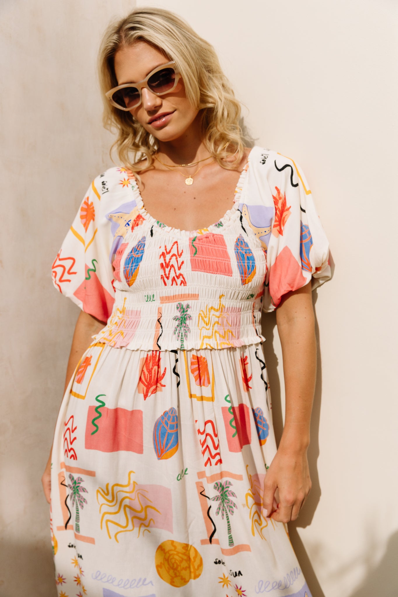 Shirred bodice midi dress in striking print inspired by Ibiza