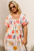 Shirred bodice midi dress in striking print inspired by Ibiza