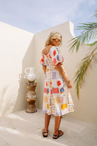 Shirred bodice midi dress in striking print inspired by Ibiza