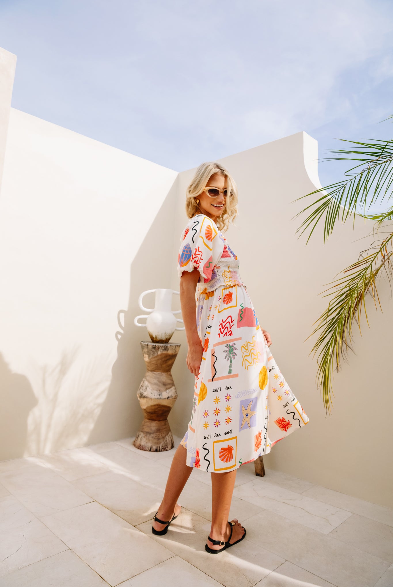 Shirred bodice midi dress in striking print inspired by Ibiza