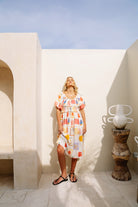 Shirred bodice midi dress in striking print inspired by Ibiza