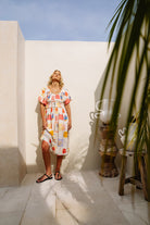 Shirred bodice midi dress in striking print inspired by Ibiza