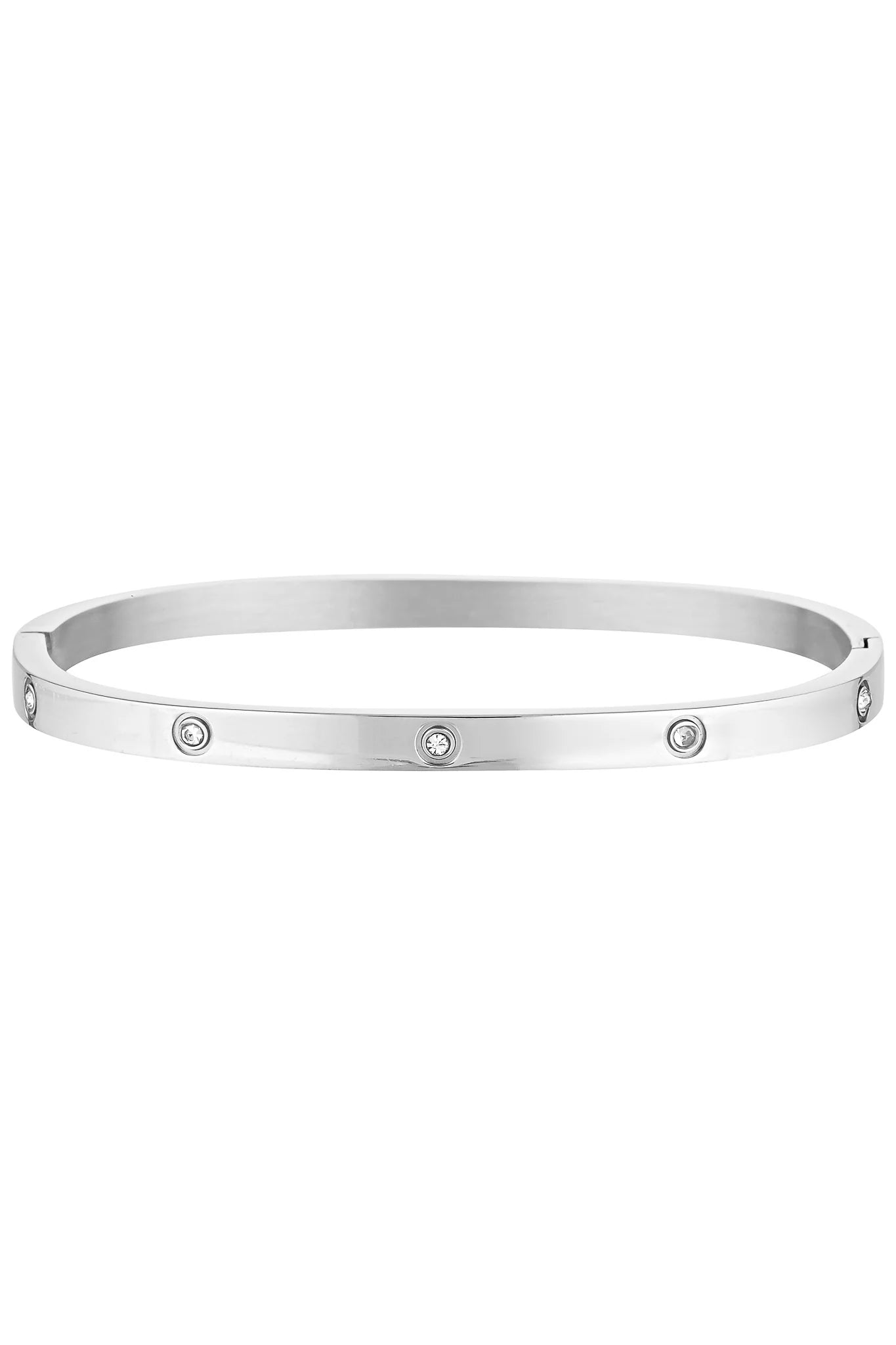 Silver bangle with embedded stones on a white background