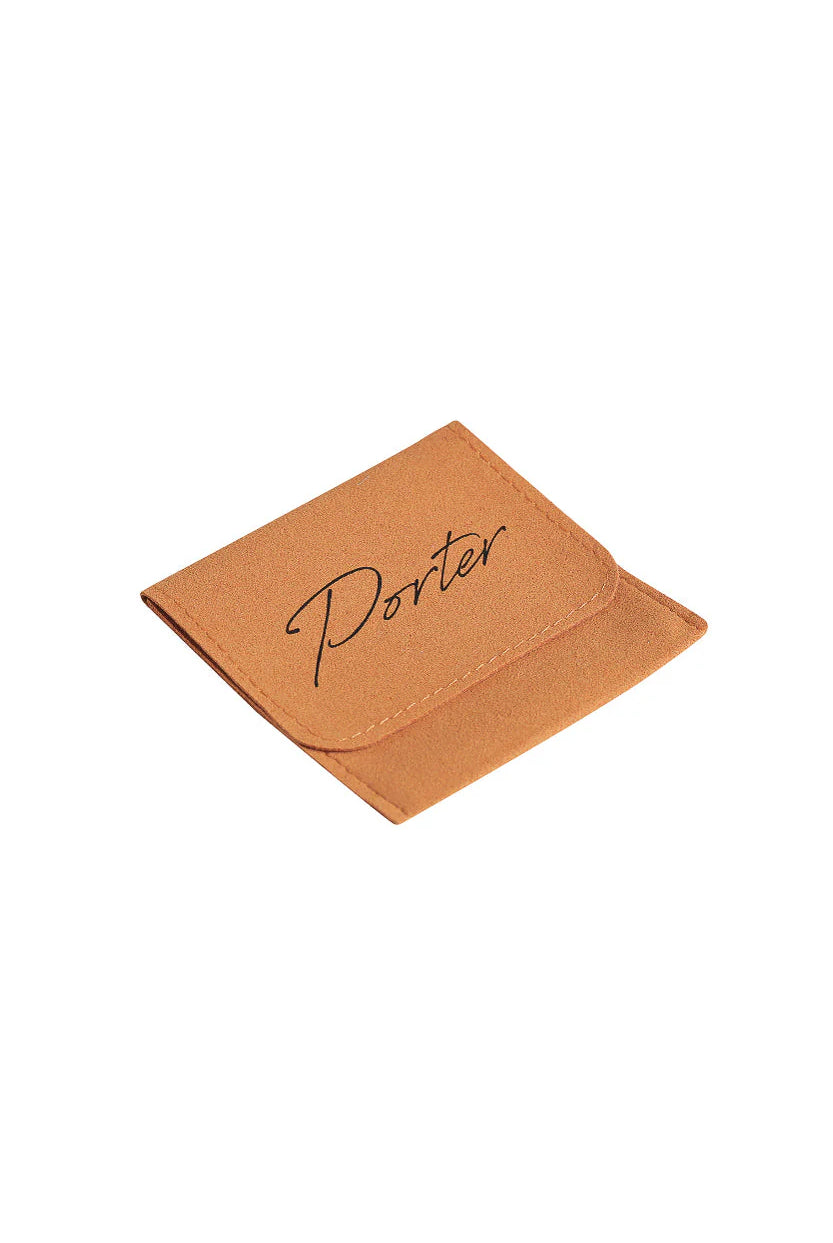 Brown leather wallet with 'Porter' branding on a white background