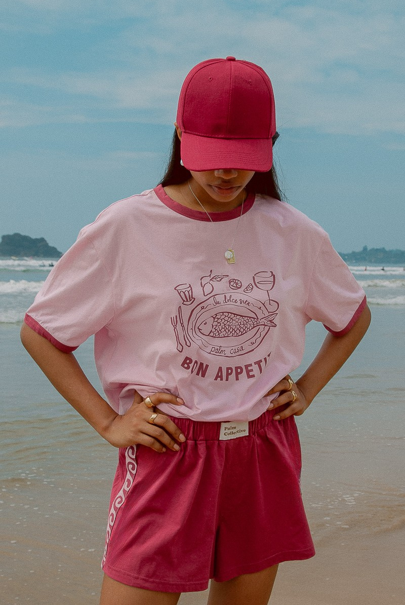 Pink shorts with contrast tape on sides