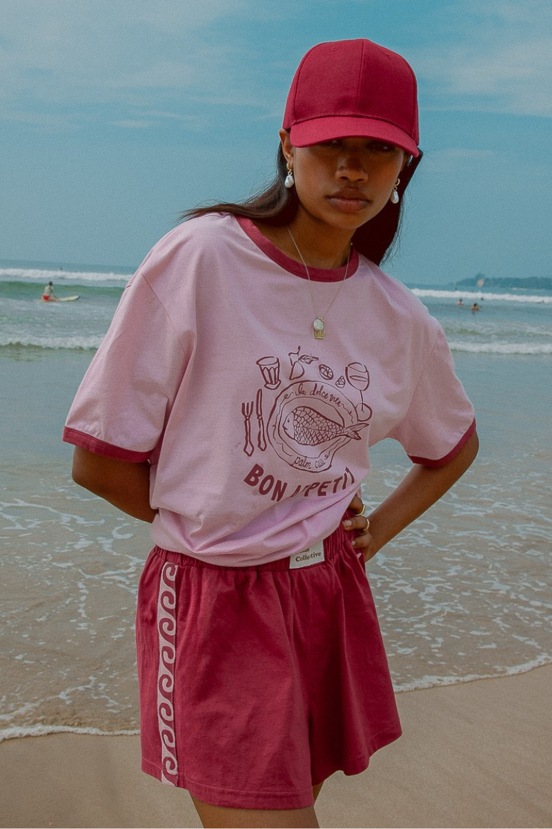 Pink shorts with contrast tape on sides