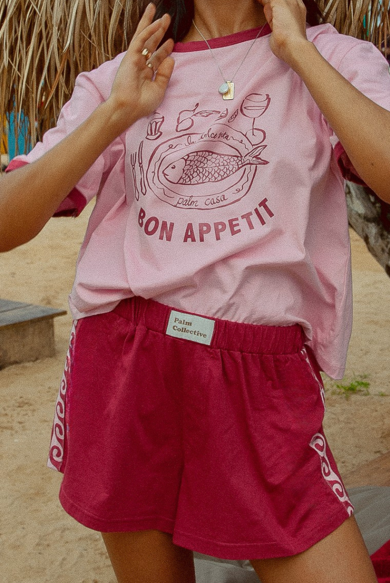 Pink shorts with contrast tape on sides