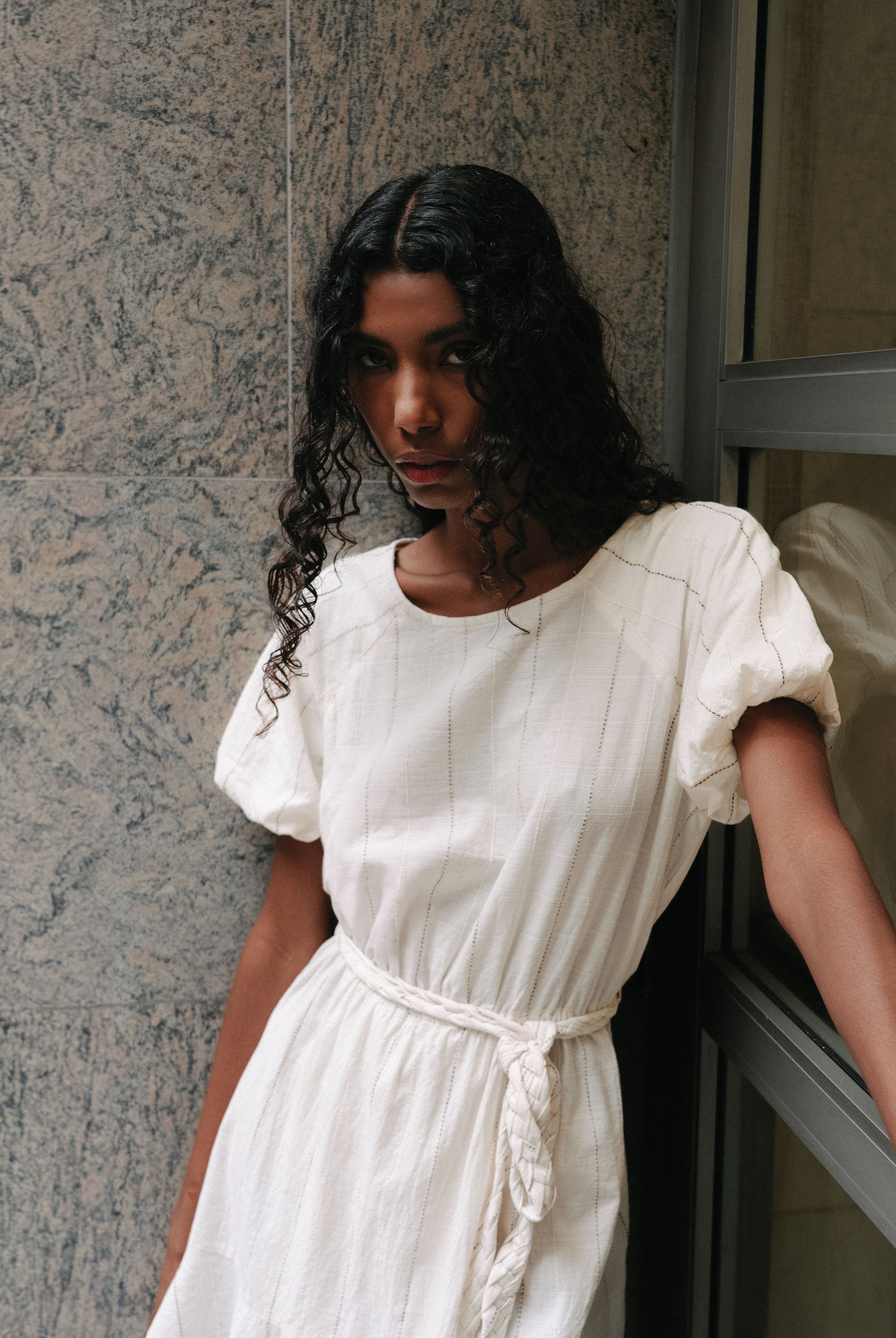 White sustainable cotton mini dress with belt