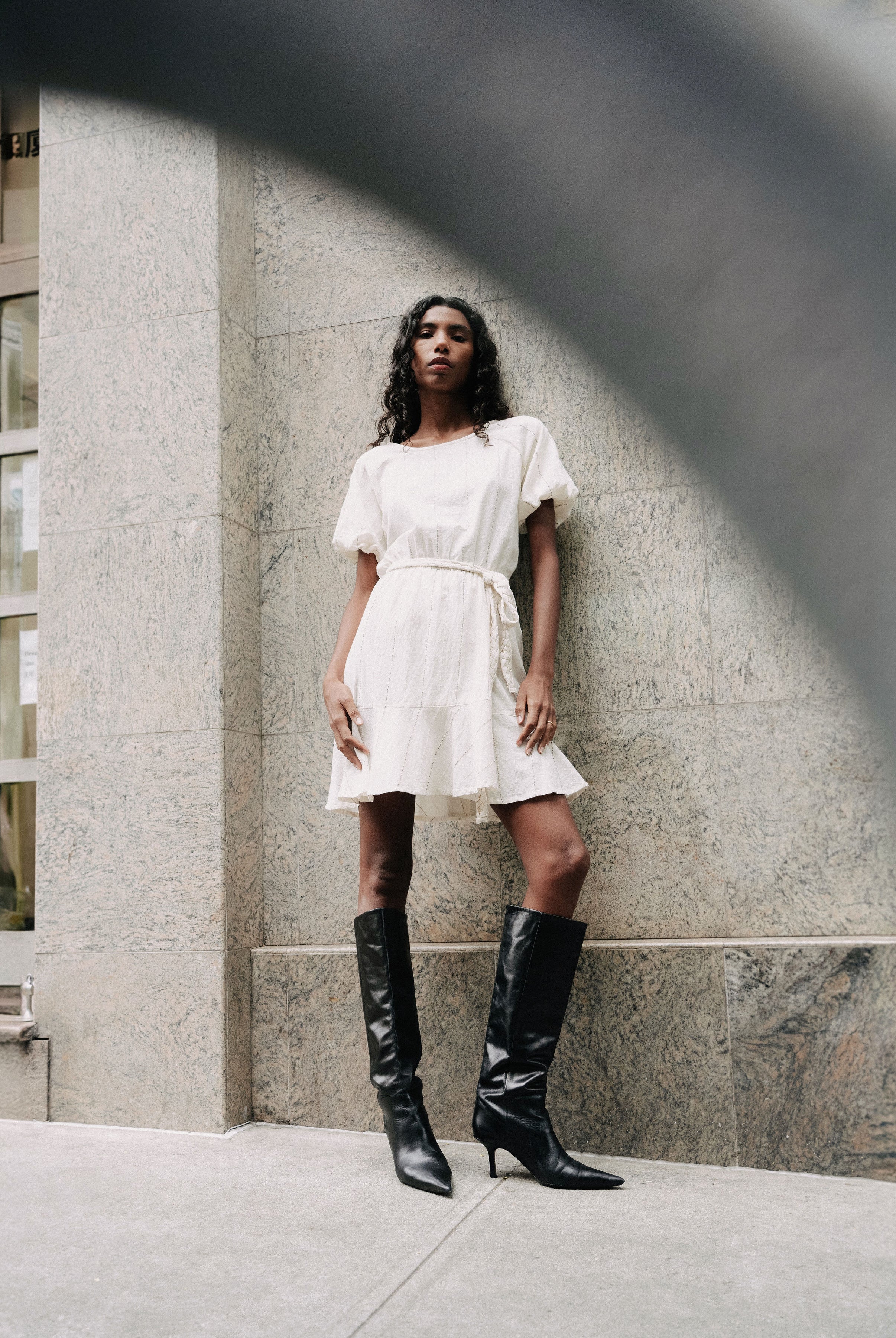 White sustainable cotton mini dress with belt