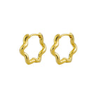 A pair of gold-colored hoop earrings with an organic curved shape.